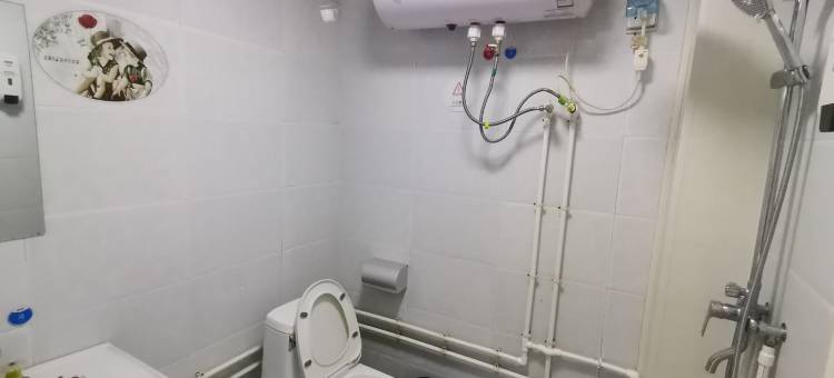 OYO新郑莱湾宾馆(河南工程学院店)图片