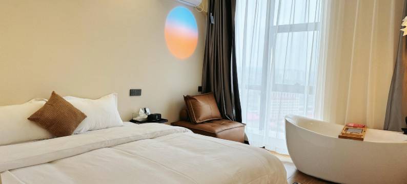 山茶花·艺术酒店(花溪大学城店)图片