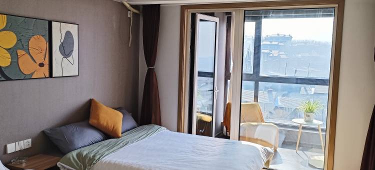 房东小张温泉公寓(遵化汤泉宫星空水世界店)图片