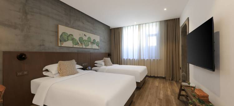 隐逸酒店(东环不夜城中东大市场店)图片