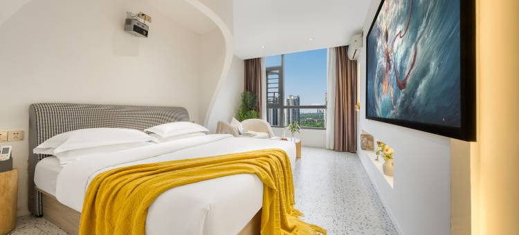 黔花之筑·巨幕轻奢花海酒店(黔西高铁站步行街店)图片