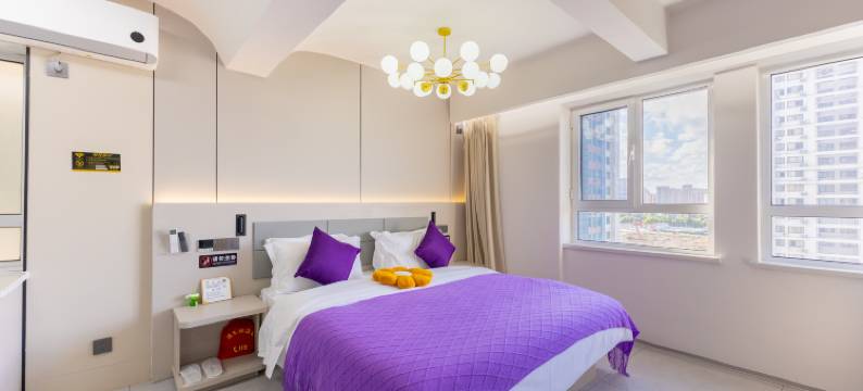 合悦观海影音酒店(烟台大学国际博览中心店)图片