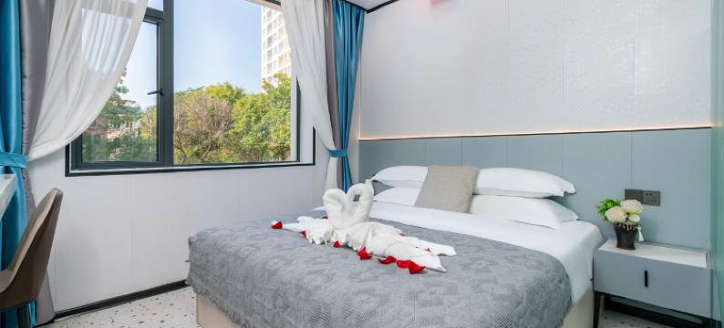 北海银滩逸龙影音酒店(国际客运港码头店)图片