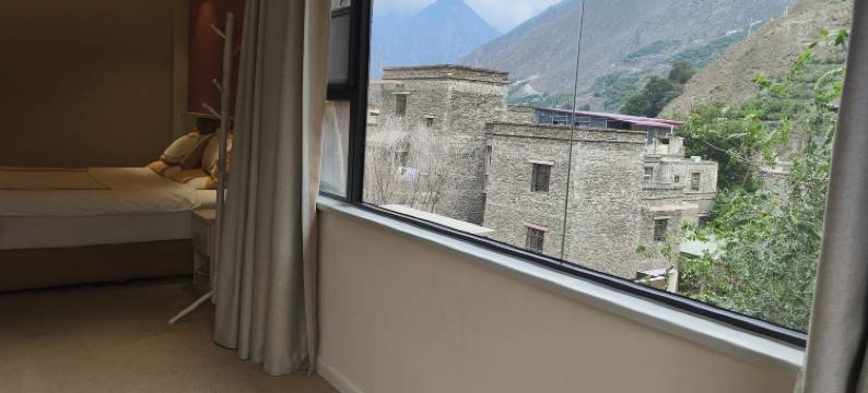 理县水云间酒店(桃坪羌寨景区店)图片