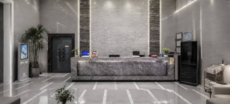TOWO上品酒店(海湖万达广场唐道637店)图片