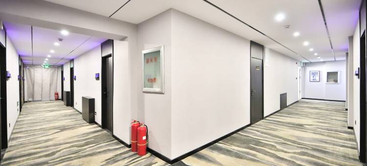 白城回家商务宾馆(火车站新华东大路店)图片