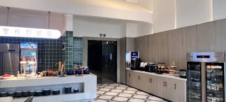 潮漫酒店(哈尔滨远大购物中心音乐公园店)图片