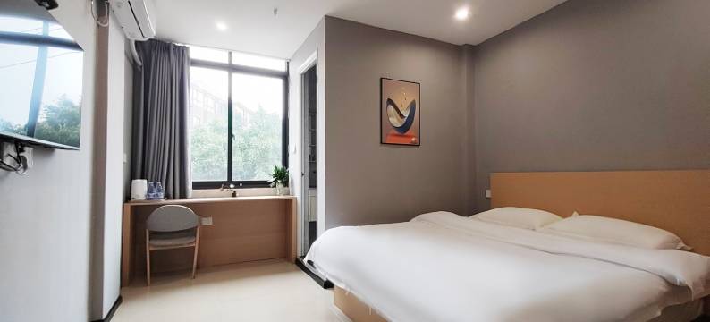 米晨家酒店(南充汽车站店)图片