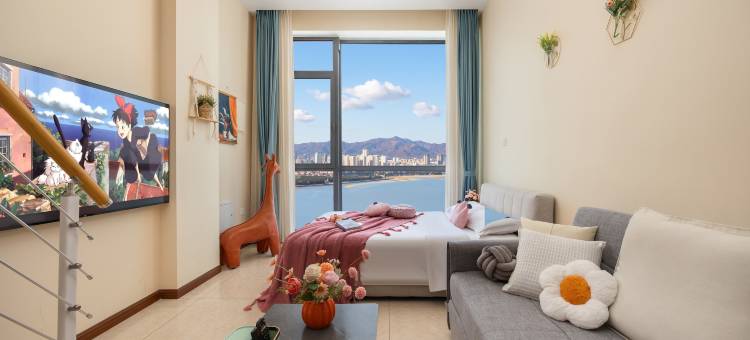 雅居海LOFT海景公寓(威海站华发九龙湾店)图片