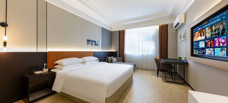 智怡城市酒店(经开区万达店)图片