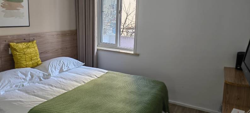 悦客100酒店(青岛北岭地铁站店)图片