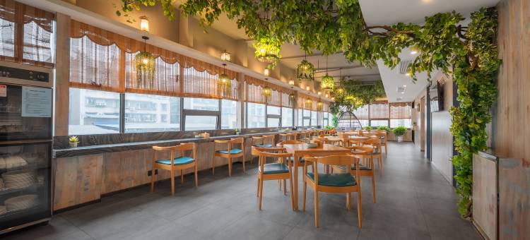 悦森·禧致酒店(城市中心广场老达一中店)图片