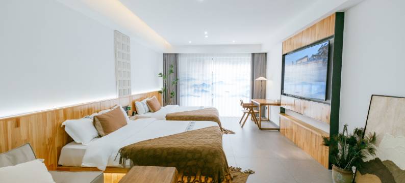 一宿酒店(乐山高铁站世豪广场店)图片