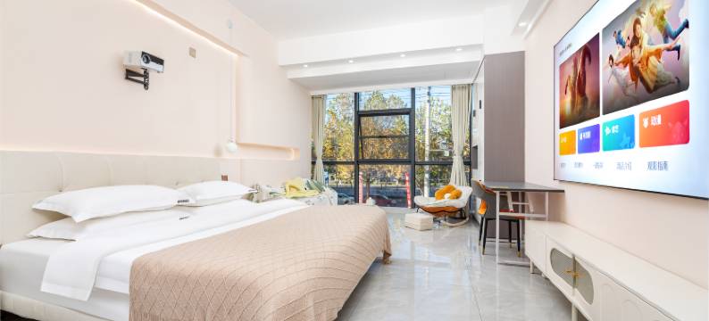 栖畔轻雅酒店(三门峡体育中心店)图片