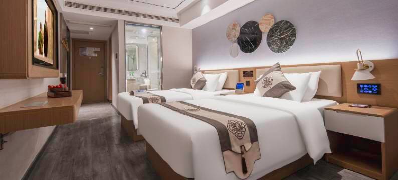 咖曼酒店(万象城六沟垅地铁站店)图片