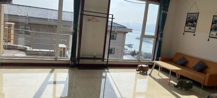 威海清风逸养主题客栈(半月湾沙滩海源公园店)图片