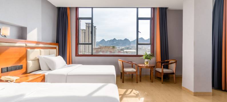 明悦酒店(文山三七国际交易市场城南汽车客运站店)图片