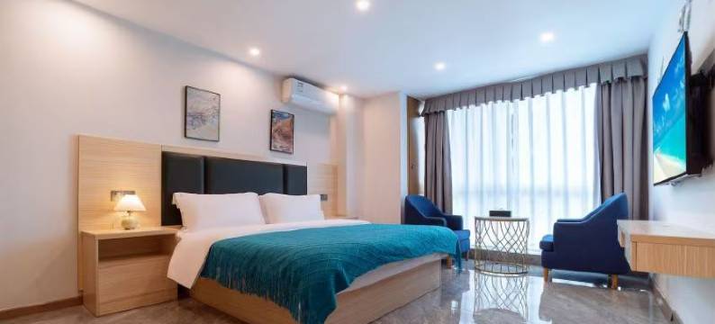 青山春风里民宿(富雅国际生活广场店)图片