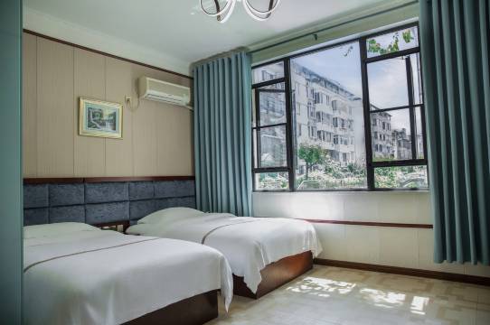 金江商务酒店(金堂万达店)