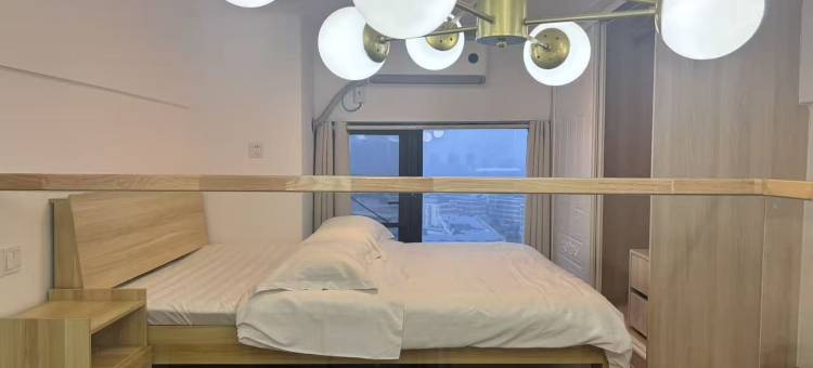 沐风•轻奢影院loft公寓(力高雍湖国际鱼尾洲地铁站店)图片