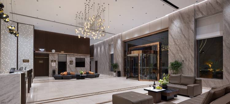 新信汤泉酒店(新乡宝龙广场大学城店)图片