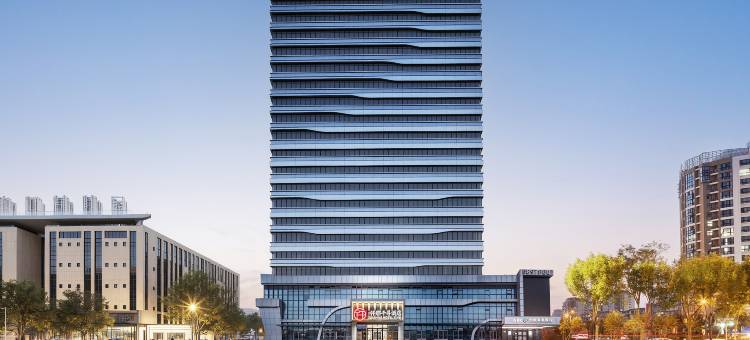 仟那千寻酒店(新乡红旗区新飞大道店)图片