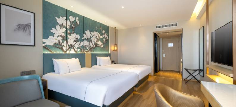 白玉兰商务酒店(盐城上冈镇产业园易家乐店)图片