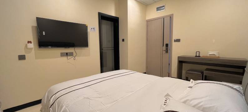 六盘水市钟山区昀扬酒店(凉都体育中心店)图片