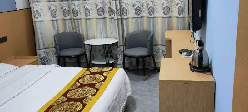 酒泉红彤彤宾馆(钟鼓楼汉唐美食街店)图片