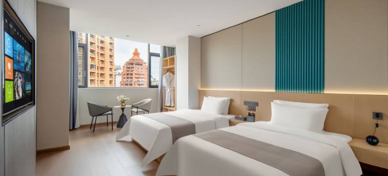 景洪昕雅·云端观澜| Xishuangbannag假日酒店(告庄星光夜市店)图片