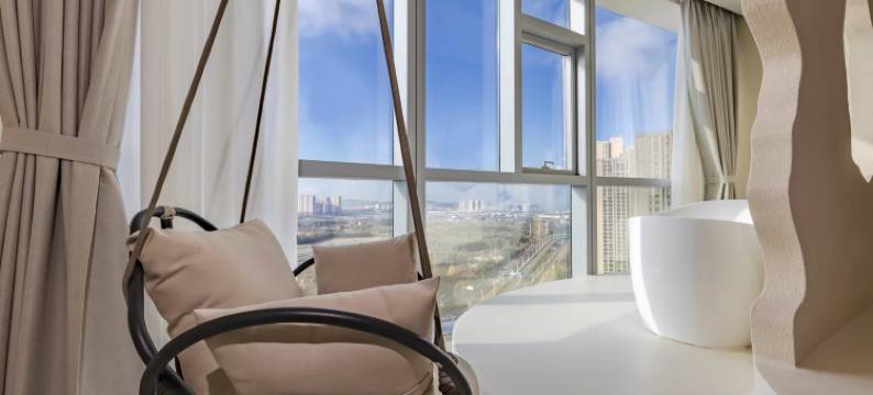 花容设计师酒店(昆明南站七彩云南第壹城店)图片