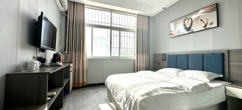 新优庭宾馆(唐河友兰大道店)图片