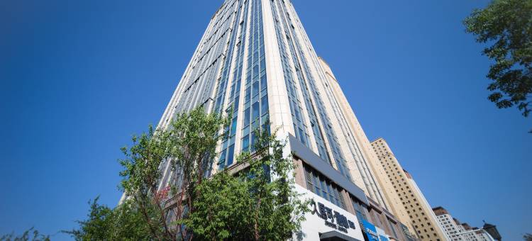 久居可漫咖酒店(乌鲁木齐高铁站店)图片