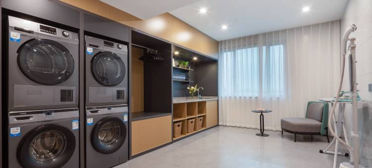 紫金·花居雅舍酒店(长兴东鱼坊九汇城店)图片