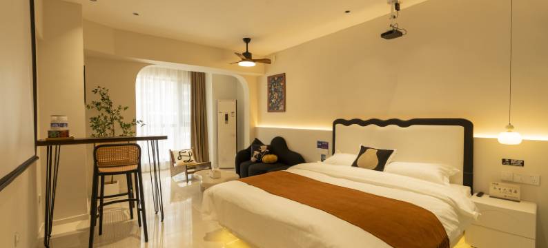 自然醒酒店(万达广场牡丹广场地铁站店)图片