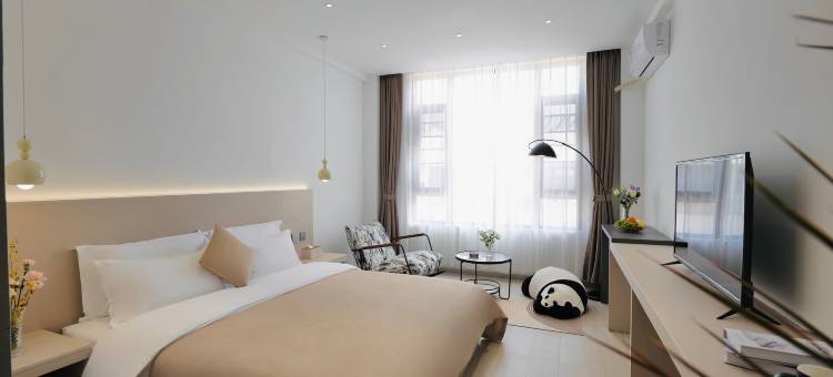 大理屋里请客栈(兴盛大桥洱海月湿地公园店)图片