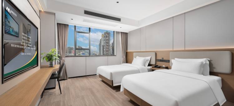 丽明居酒店(南宁师范大学明秀路校区北湖南路地铁站店)图片