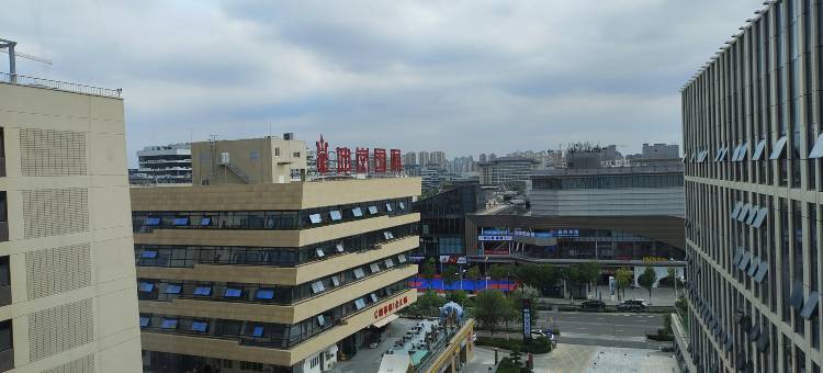 芒果AI酒店(市政府吾悦广场)图片