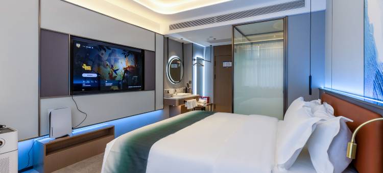 叶与晨电竞电影酒店(新华街尚峰广场店)图片