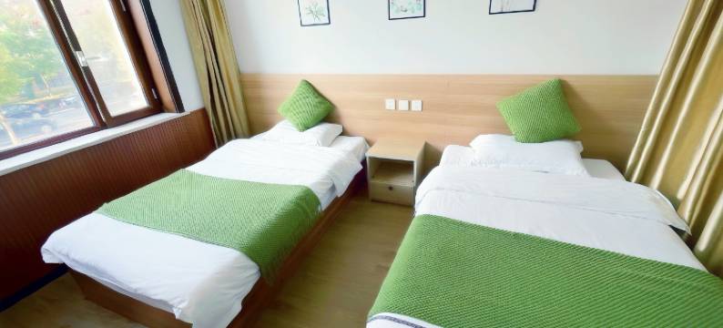 红豆杉宾馆(长白山北坡集散中心云顶市集店)图片