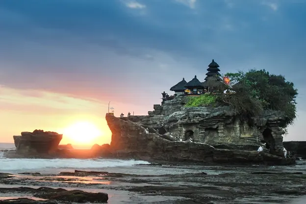 Temple on a rock in Bali during sunset