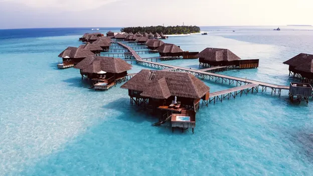 Overhead view of overwater bungalows in the Maldives