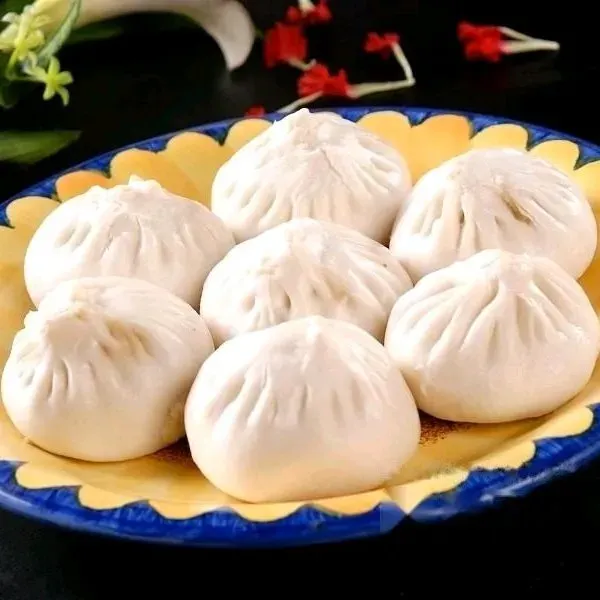 老梁包子店美食图片