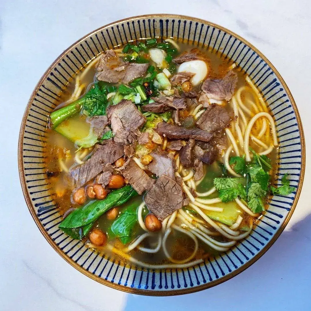 苗家牛杂王(华庭街店)