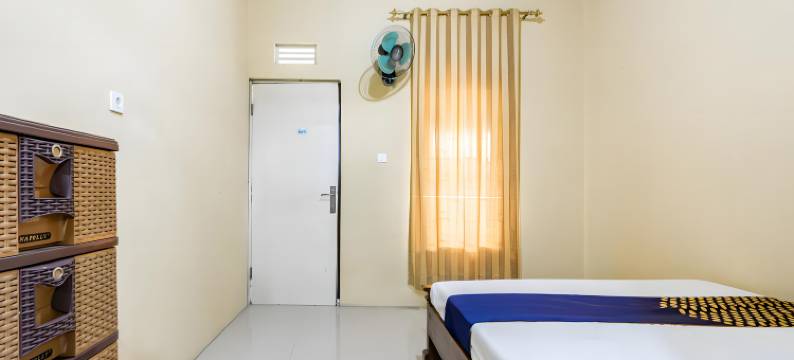 O肯查纳民宿-清真-靠近卡纽兰阿尔巴罗卡清真寺(Hotel O Kencana Homestay Syariah Near Masjid AL-BAROKAH Kanyuran)图片