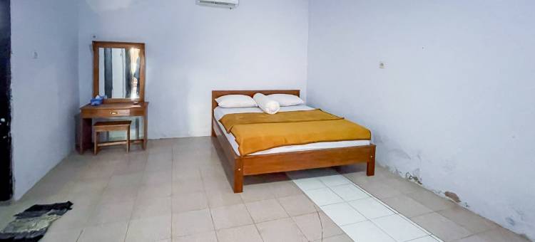布莱伦阳光安宁RedDoorz宾馆(Guest House Surya Ayu Permai Buleleng Mitra RedDoorz)图片