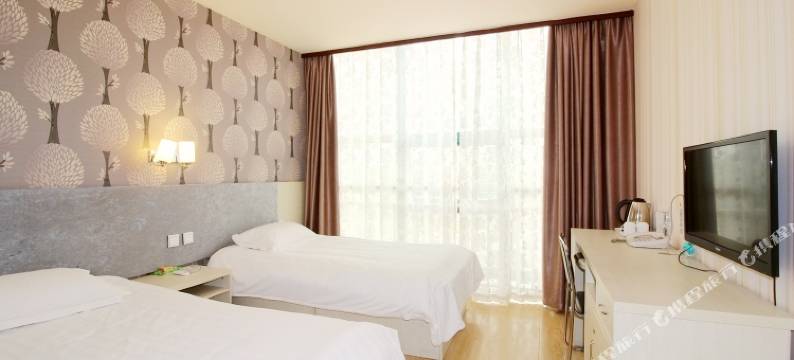 爱客100连锁宾馆(青岛流亭商务区二店)图片