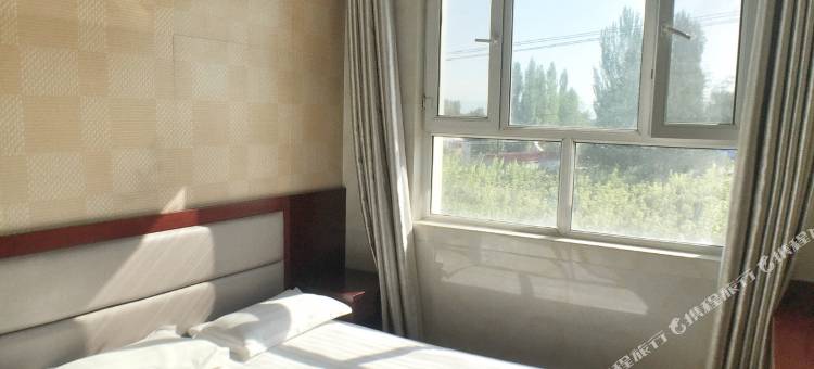 Q加·霍尔果斯六十二团雅富达商务酒店图片