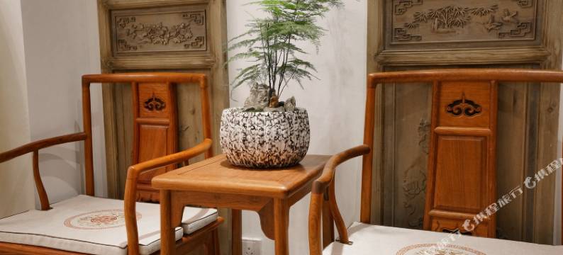 闻来新中式民宿(南马花园红木家具城商业中心店)图片