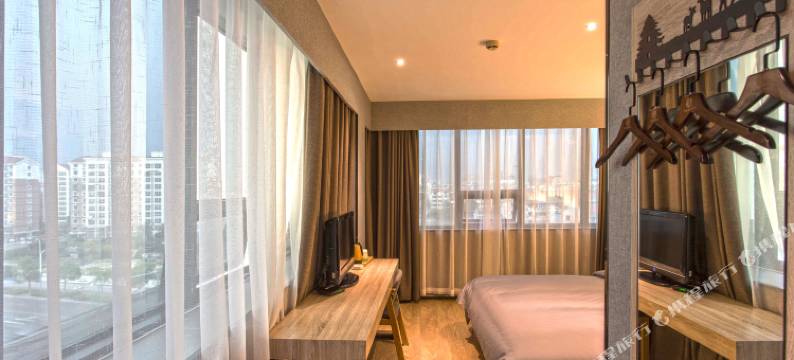 张家港迷白艺术酒店(大成广场店)图片